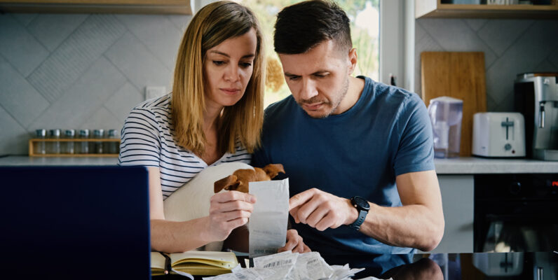 Married couple worried about health care costs.